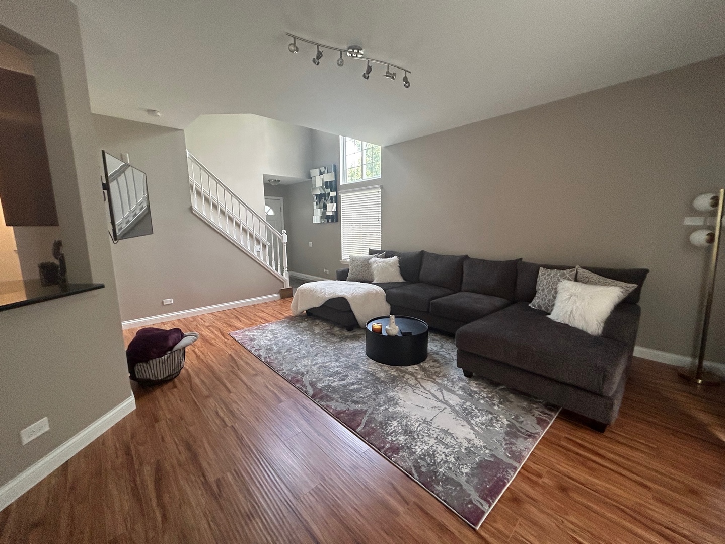 1561 Spaulding Road Bartlett, IL 60103 - Photo 6 of 25 a living room with furniture and a wooden floor