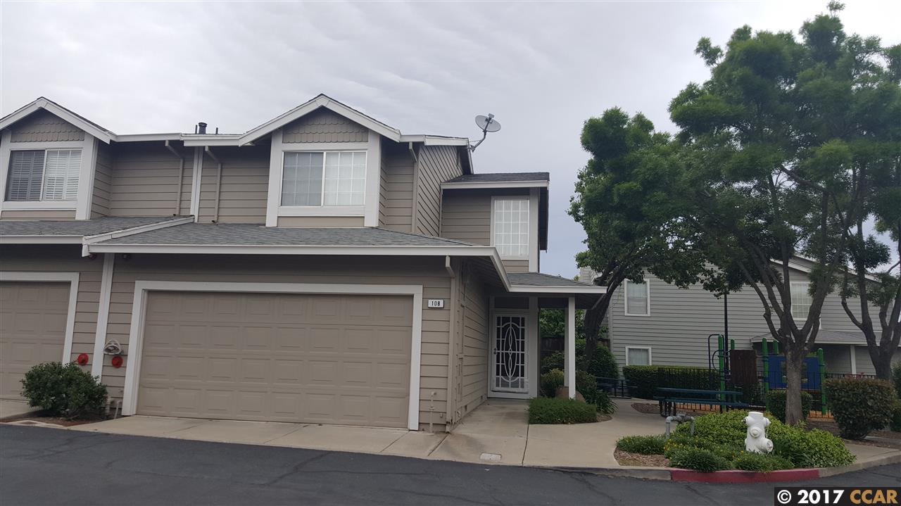 108 Harris Circle Bay Point, CA 94565 - Photo 1 of 1 a front view of a house with a yard and garage