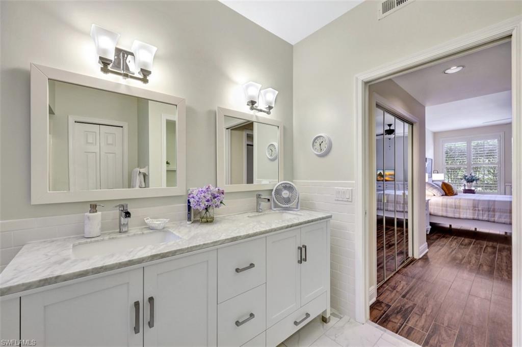 7768 Gardner Drive, Unit 103 Naples, FL 34109 - Photo 17 of 27 Primary Bathroom