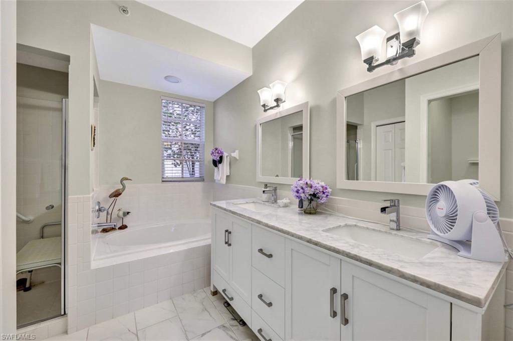 7768 Gardner Drive, Unit 103 Naples, FL 34109 - Photo 18 of 27 Primary Bathroom