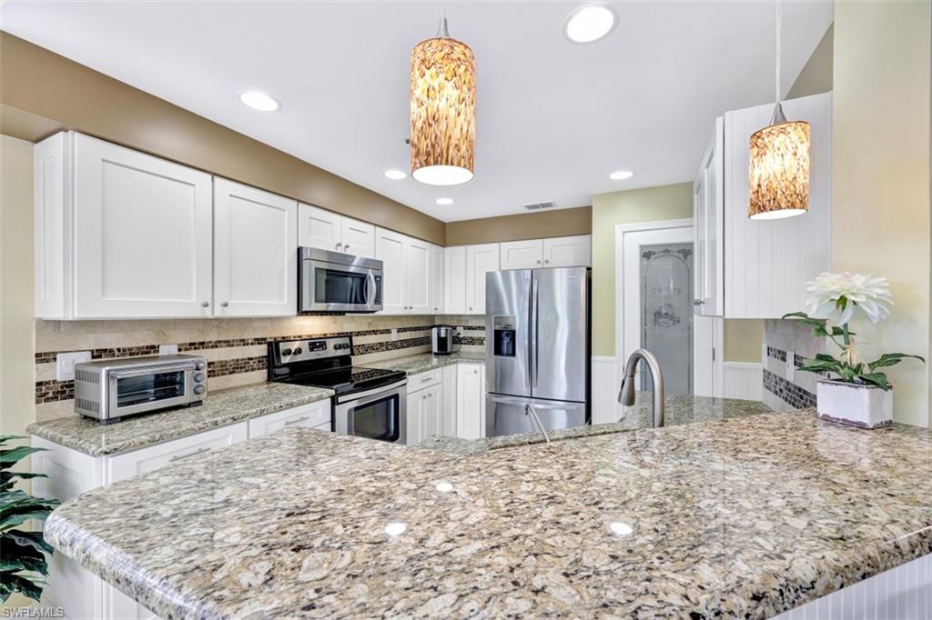 7768 Gardner Drive, Unit 103 Naples, FL 34109 - Photo 2 of 27 Upgraded Kitchen