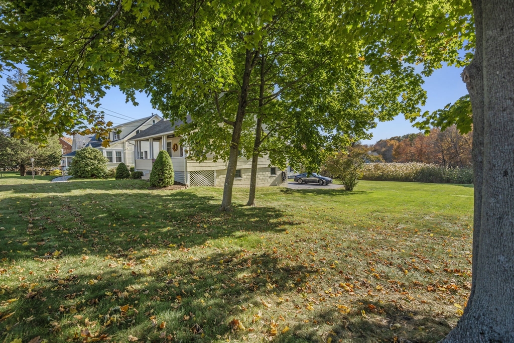 212 Elm Street Amesbury, MA 01913 - Photo 32 of 41 a view of a house with a yard