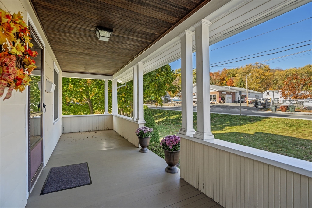 212 Elm Street Amesbury, MA 01913 - Photo 38 of 41 a view of a porch and garden