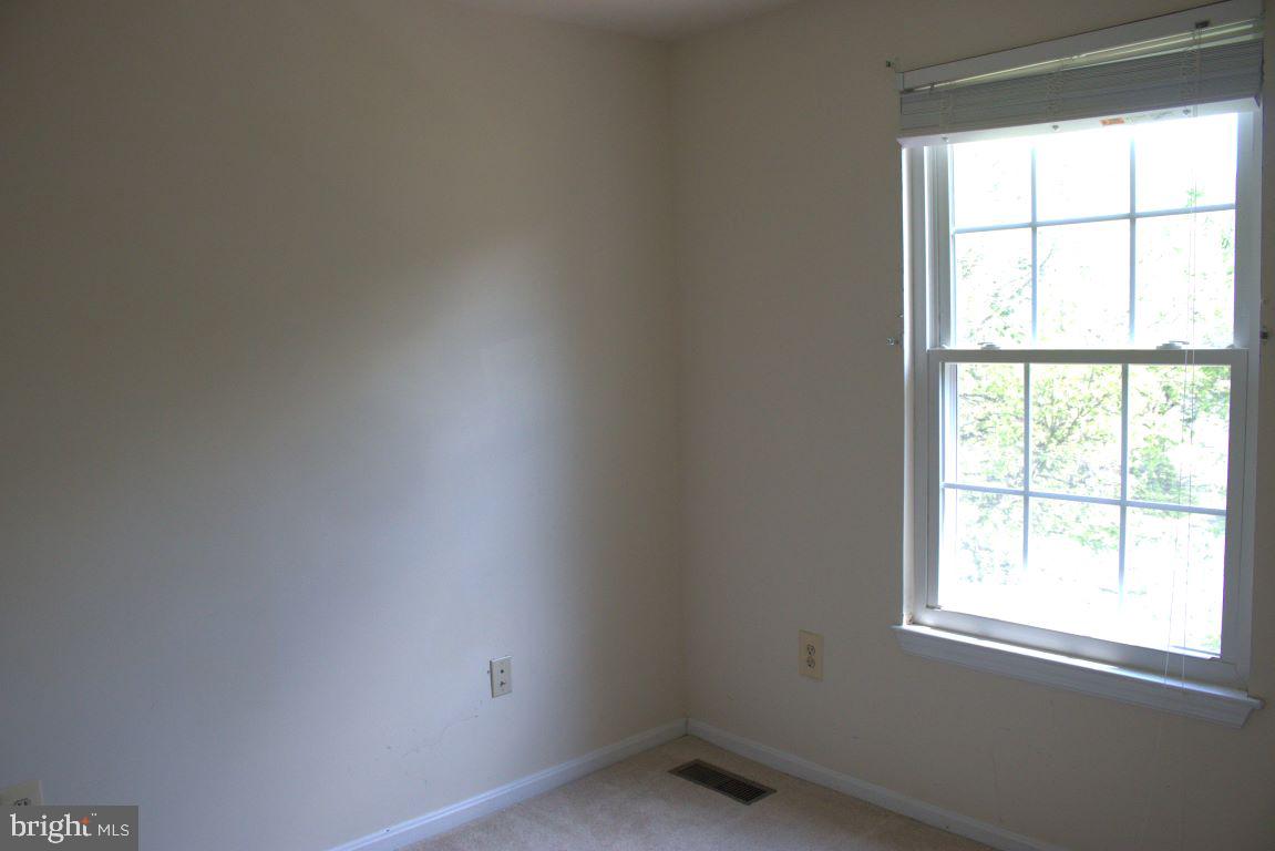 17 Habersham Court Silver Spring, MD 20906 - Photo 28 of 40 an empty room with a window