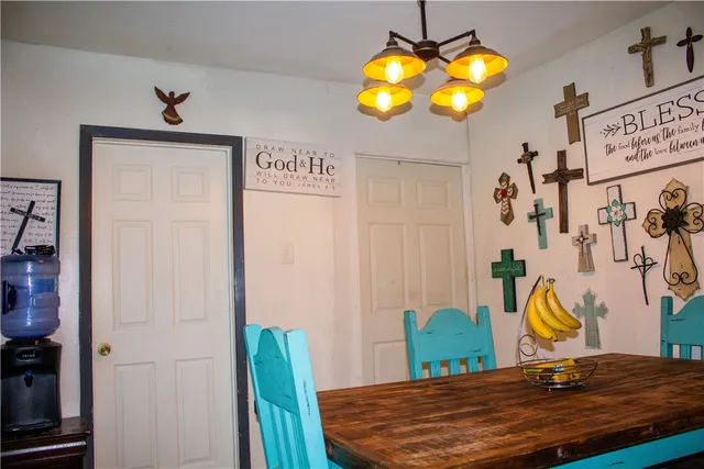 a bedroom with a bed and ceiling fan