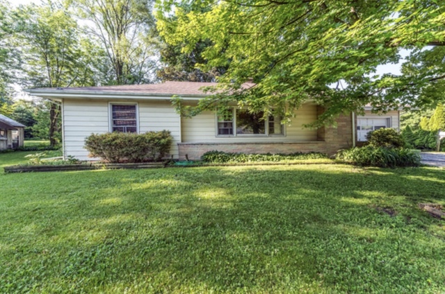 810 Parkside Road Naperville, IL 60540 - Photo 2 of 24 a view of a house with a yard