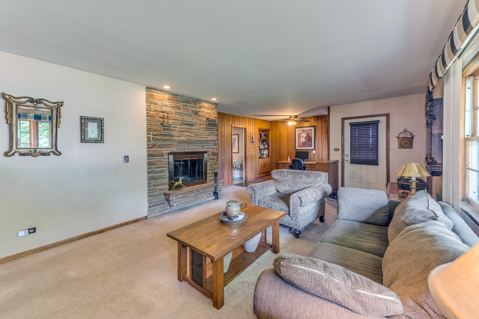 810 Parkside Road Naperville, IL 60540 - Photo 11 of 24 a living room with furniture and a fireplace