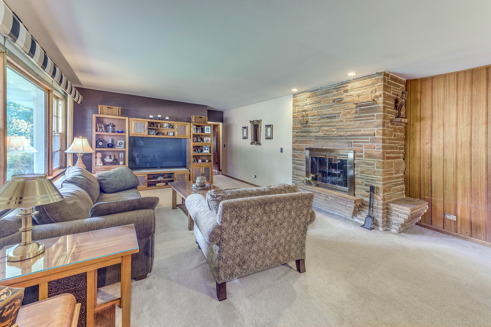 810 Parkside Road Naperville, IL 60540 - Photo 12 of 24 a living room with furniture and a fireplace