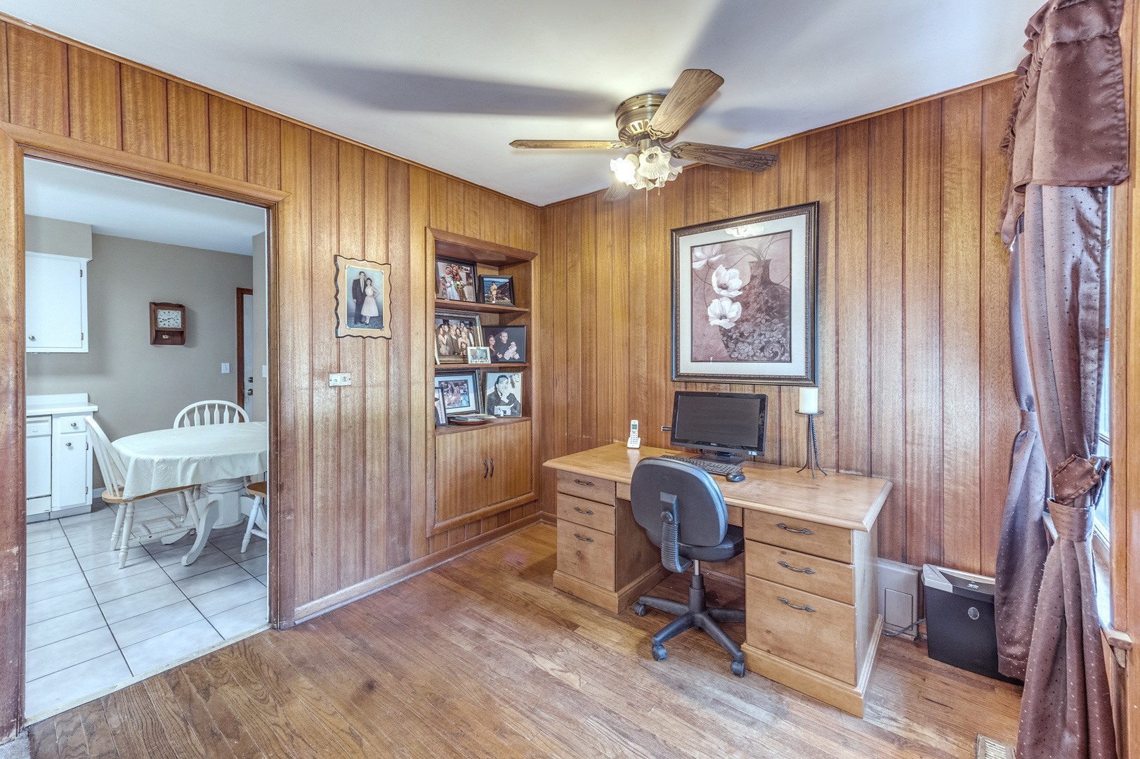 810 Parkside Road Naperville, IL 60540 - Photo 13 of 24 a view of a workspace with furniture and a window