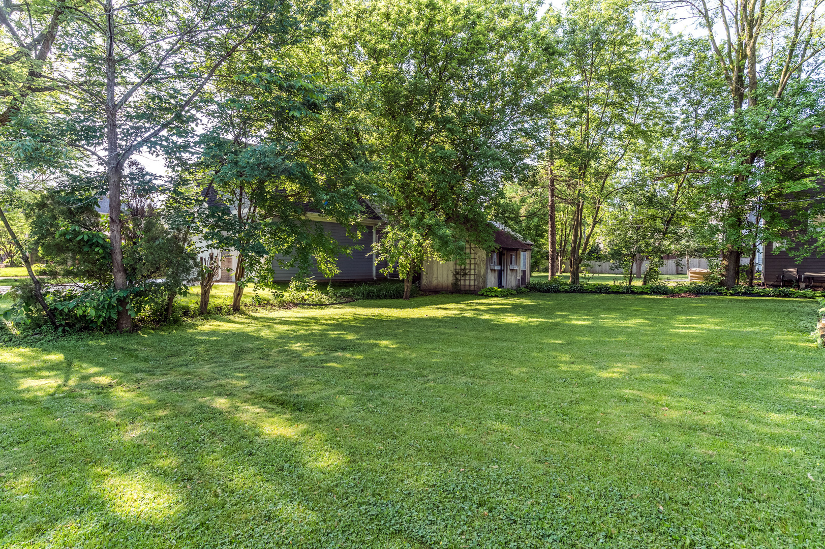 810 Parkside Road Naperville, IL 60540 - Photo 24 of 24 a view of yard with green space and trees
