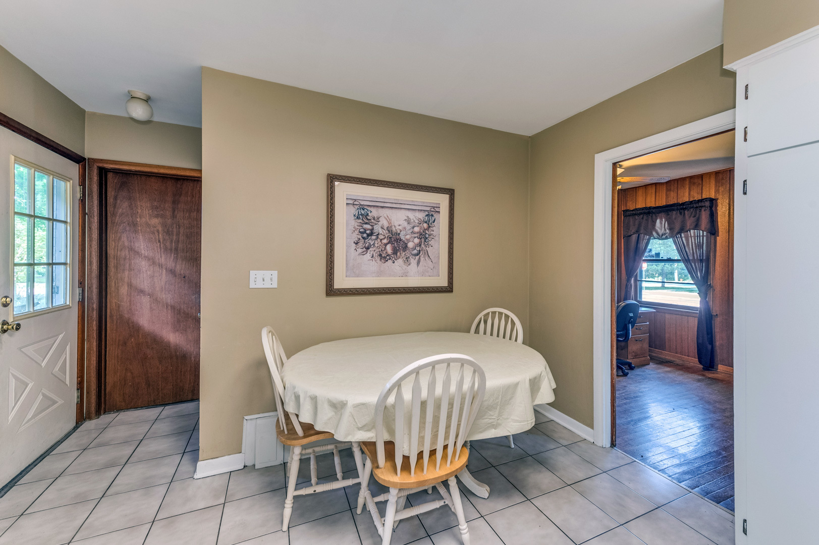 810 Parkside Road Naperville, IL 60540 - Photo 7 of 24 a bedroom with a bed and a table in it
