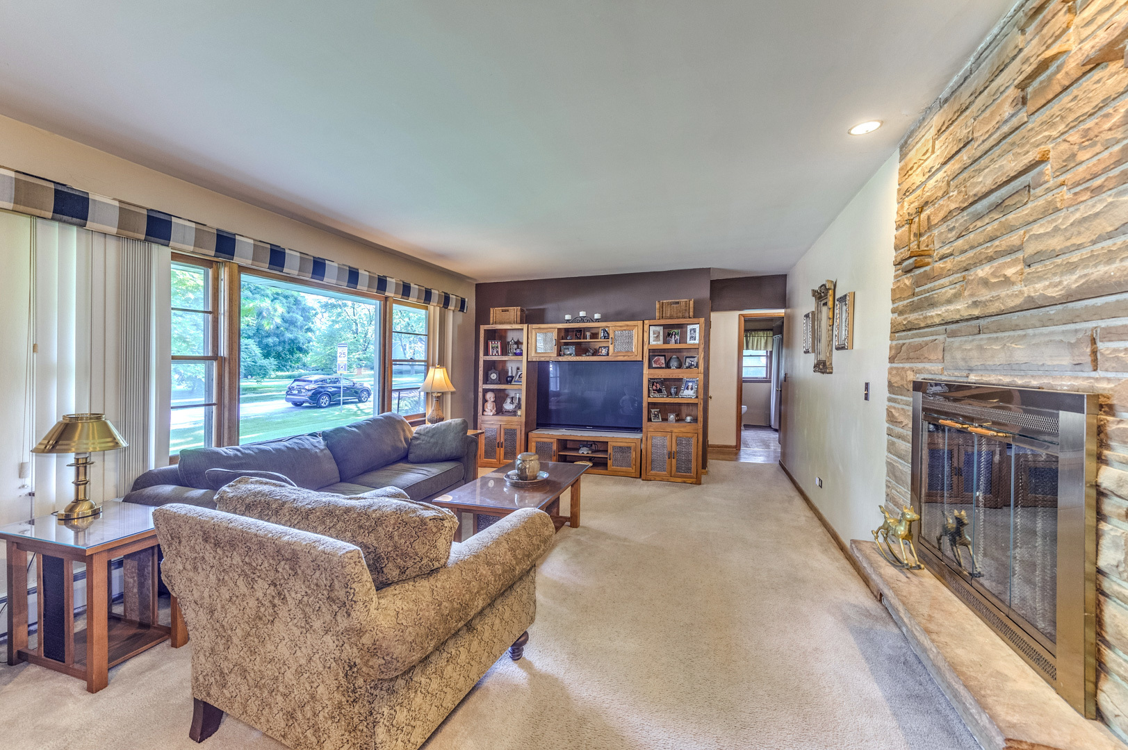 810 Parkside Road Naperville, IL 60540 - Photo 9 of 24 a living room with furniture and a large window