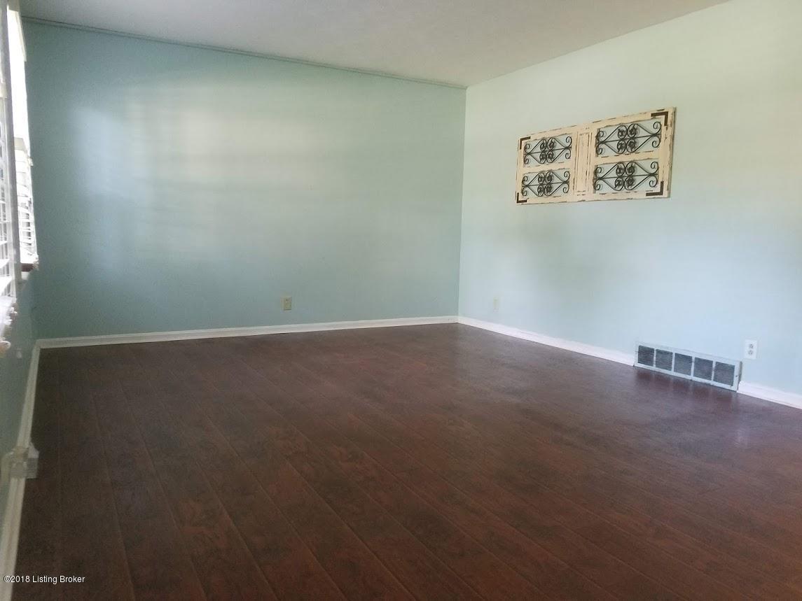 808 Echo Bridge Road Louisville, KY 40243 - Photo 5 of 23 Beautiful laminate floors in living room