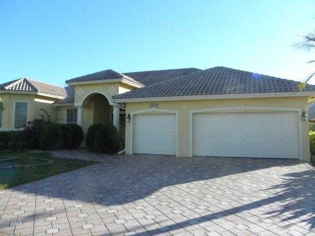 21662 Fall River Drive Boca Raton, FL 33428 - Photo 1 of 14 a front view of a house with a yard