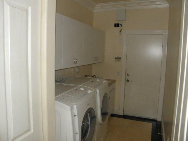 21662 Fall River Drive Boca Raton, FL 33428 - Photo 12 of 14 a utility room with dryer and washer