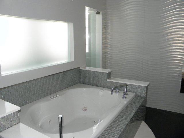 21662 Fall River Drive Boca Raton, FL 33428 - Photo 2 of 14 a bathroom with a tub and a window