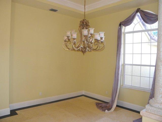 21662 Fall River Drive Boca Raton, FL 33428 - Photo 5 of 14 a view of a chandelier in a room