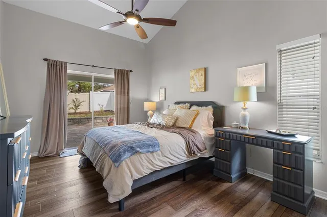 a bed room with a bed and a window