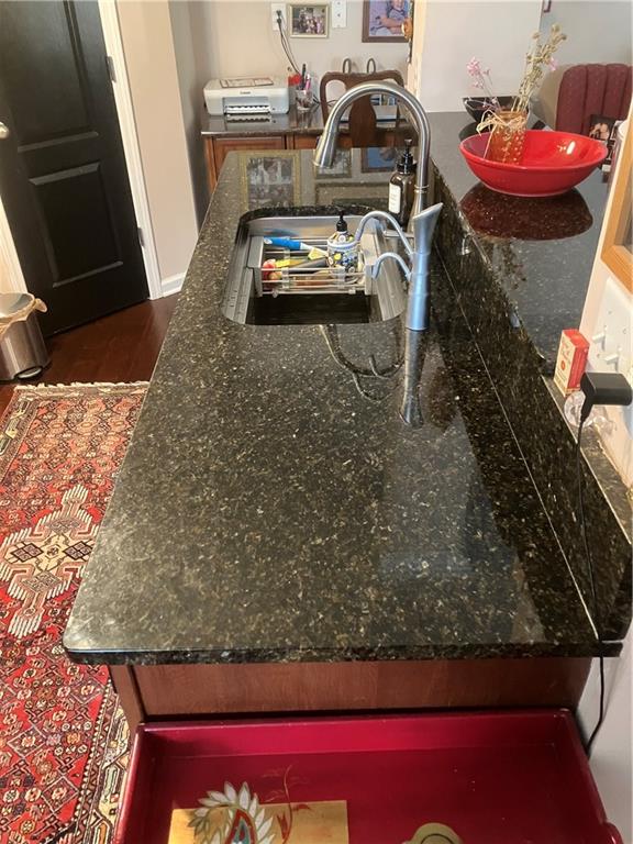 1665 Oakbrook Lake Drive Northwest Norcross, GA 30093 - Photo 13 of 24 a utility room with a sink a washer and dryer