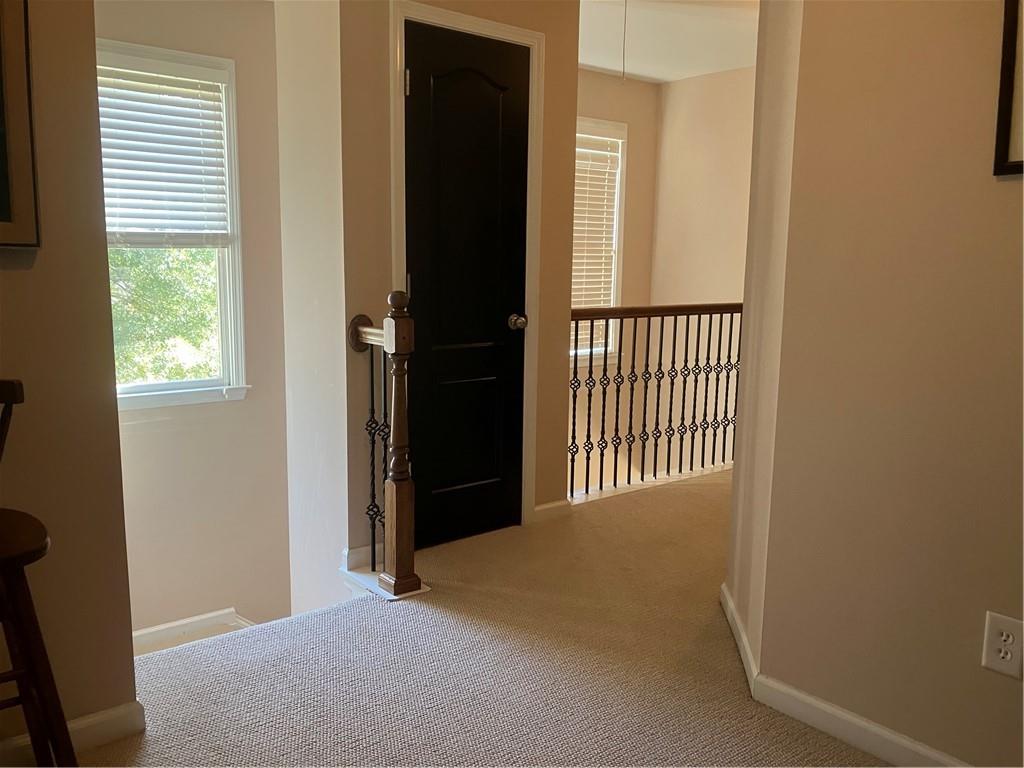 1665 Oakbrook Lake Drive Northwest Norcross, GA 30093 - Photo 19 of 24 a view of a hallway