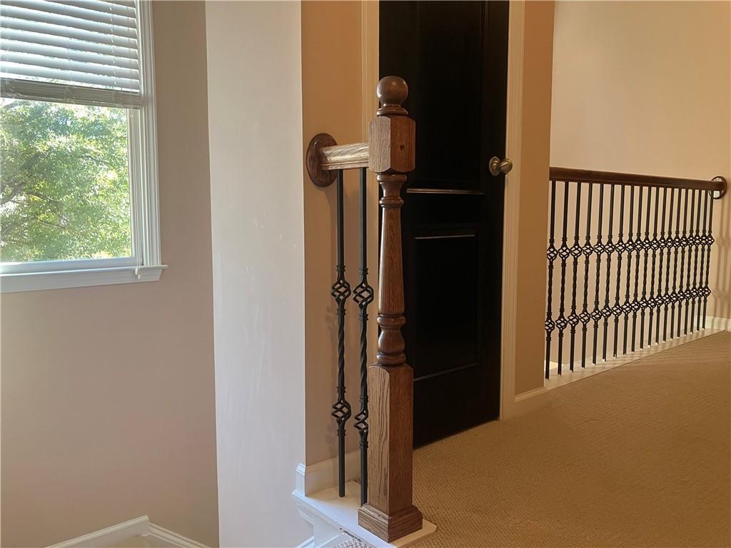 1665 Oakbrook Lake Drive Northwest Norcross, GA 30093 - Photo 20 of 24 a view of hallway with stairs