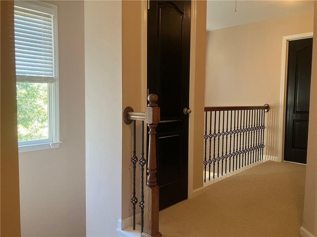 1665 Oakbrook Lake Drive Northwest Norcross, GA 30093 - Photo 21 of 24 a view of a hallway