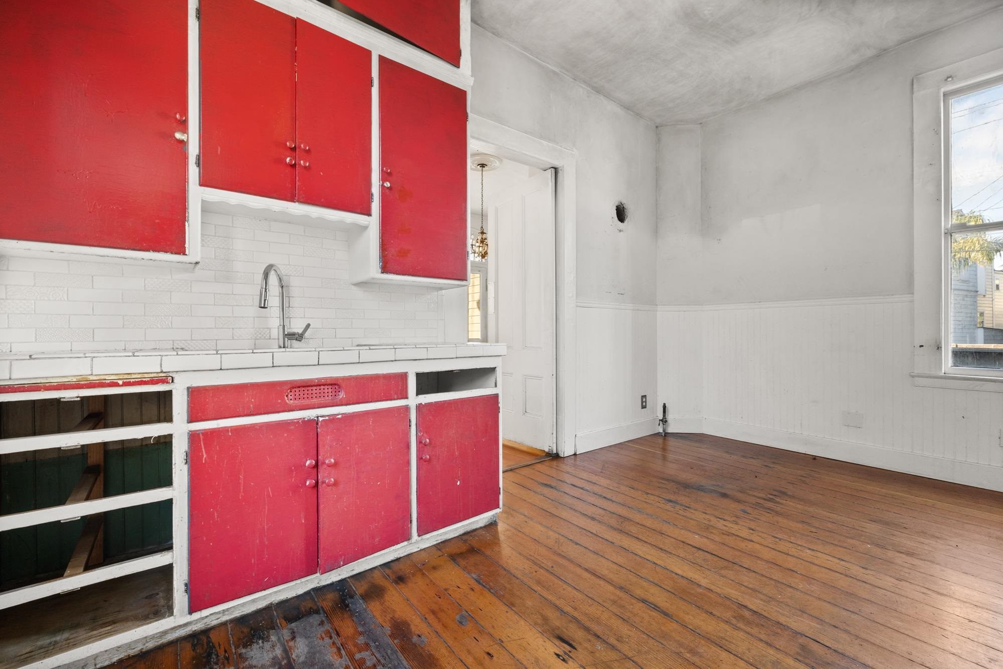 1746 8th Street Oakland, CA 94607 - Photo 12 of 52 a bathroom with a sink and a mirror