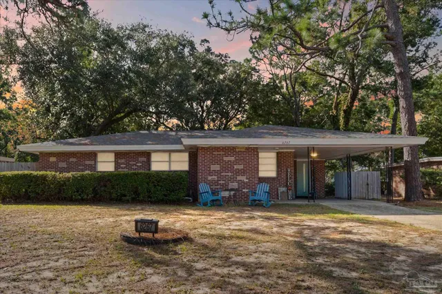 front view of a house with a yard