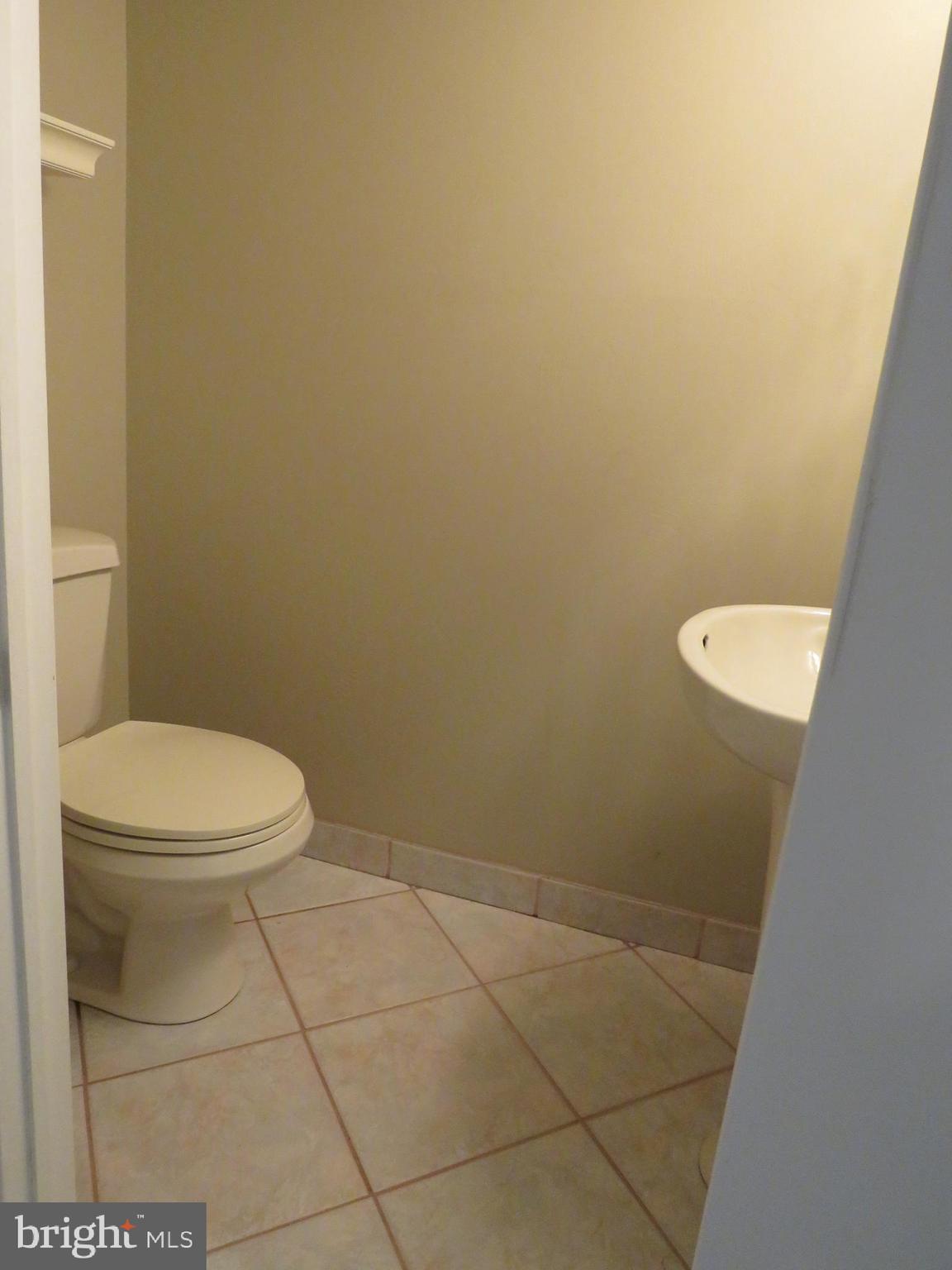1177 Willard Road Huntingdon Valley, PA 19006 - Photo 13 of 36 First floor powder near front door foyer & bedroom