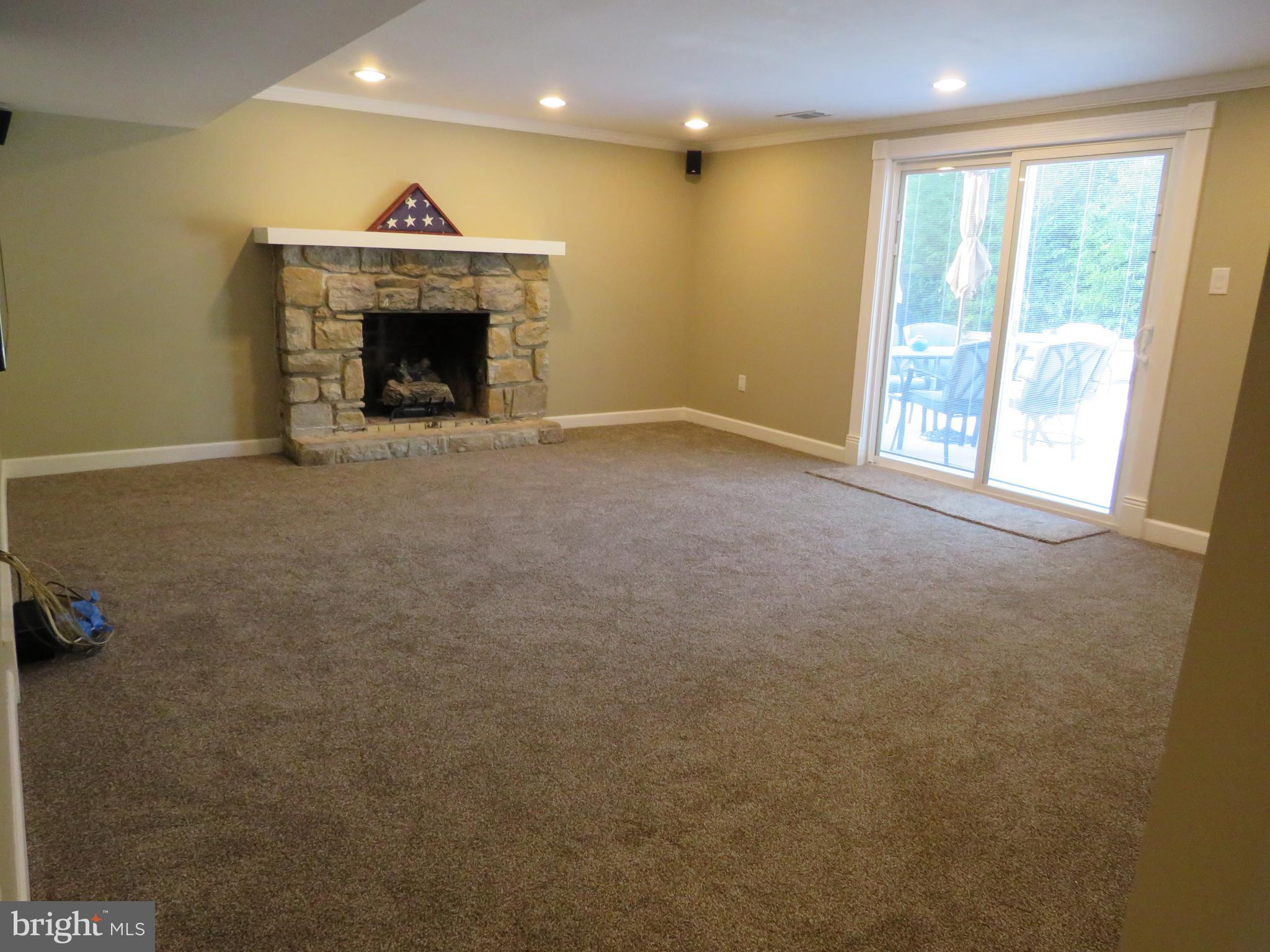 1177 Willard Road Huntingdon Valley, PA 19006 - Photo 15 of 36 Family Room with gas fpl & new carpet.