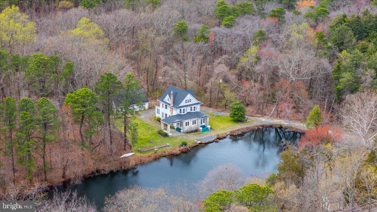 a view of a lake with a yard