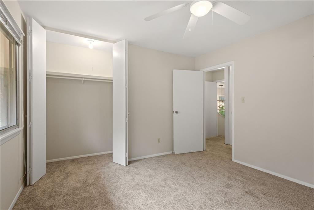 705 Edgewater Trail Sandy Springs, GA 30328 - Photo 26 of 36 an empty room with closet area