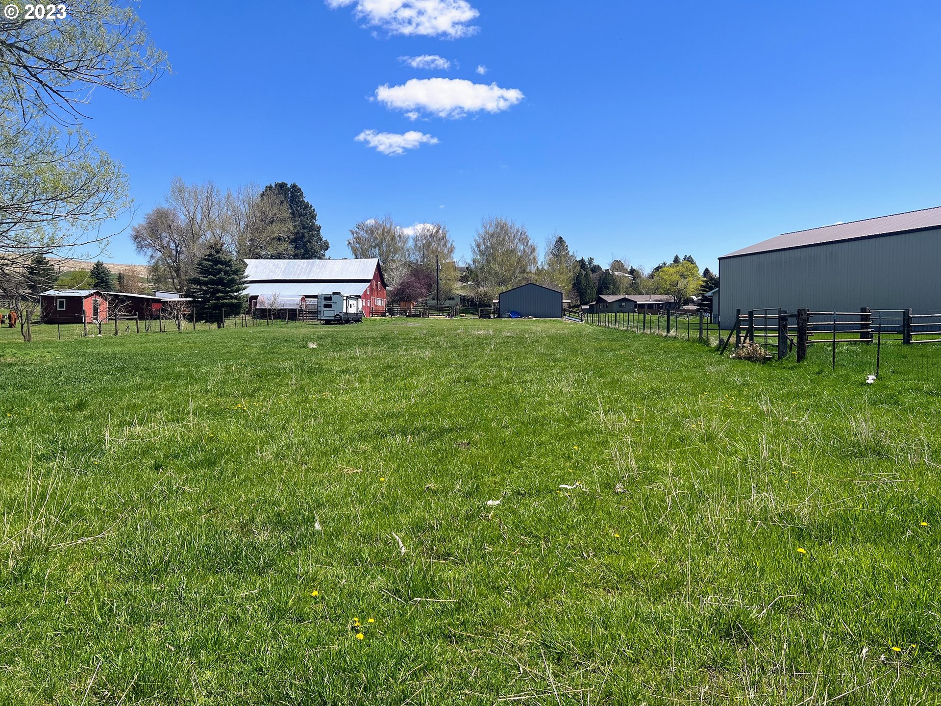 Northwest 2nd Street Enterprise, OR 97828 - Photo 2 of 9 a front view of a house with garden