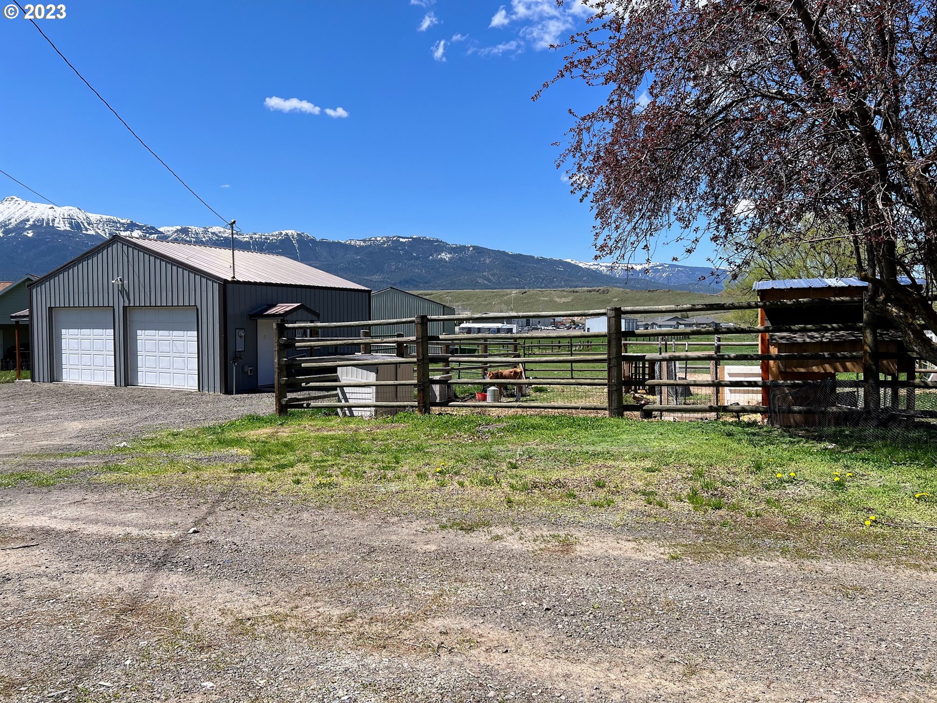 Northwest 2nd Street Enterprise, OR 97828 - Photo 5 of 9 a front view of a house with a yard
