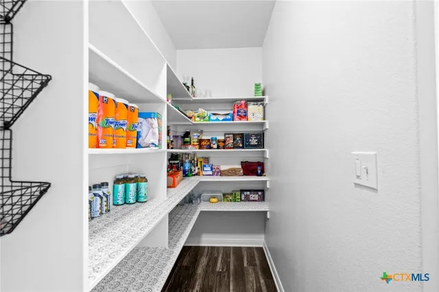 a room with storage and utility