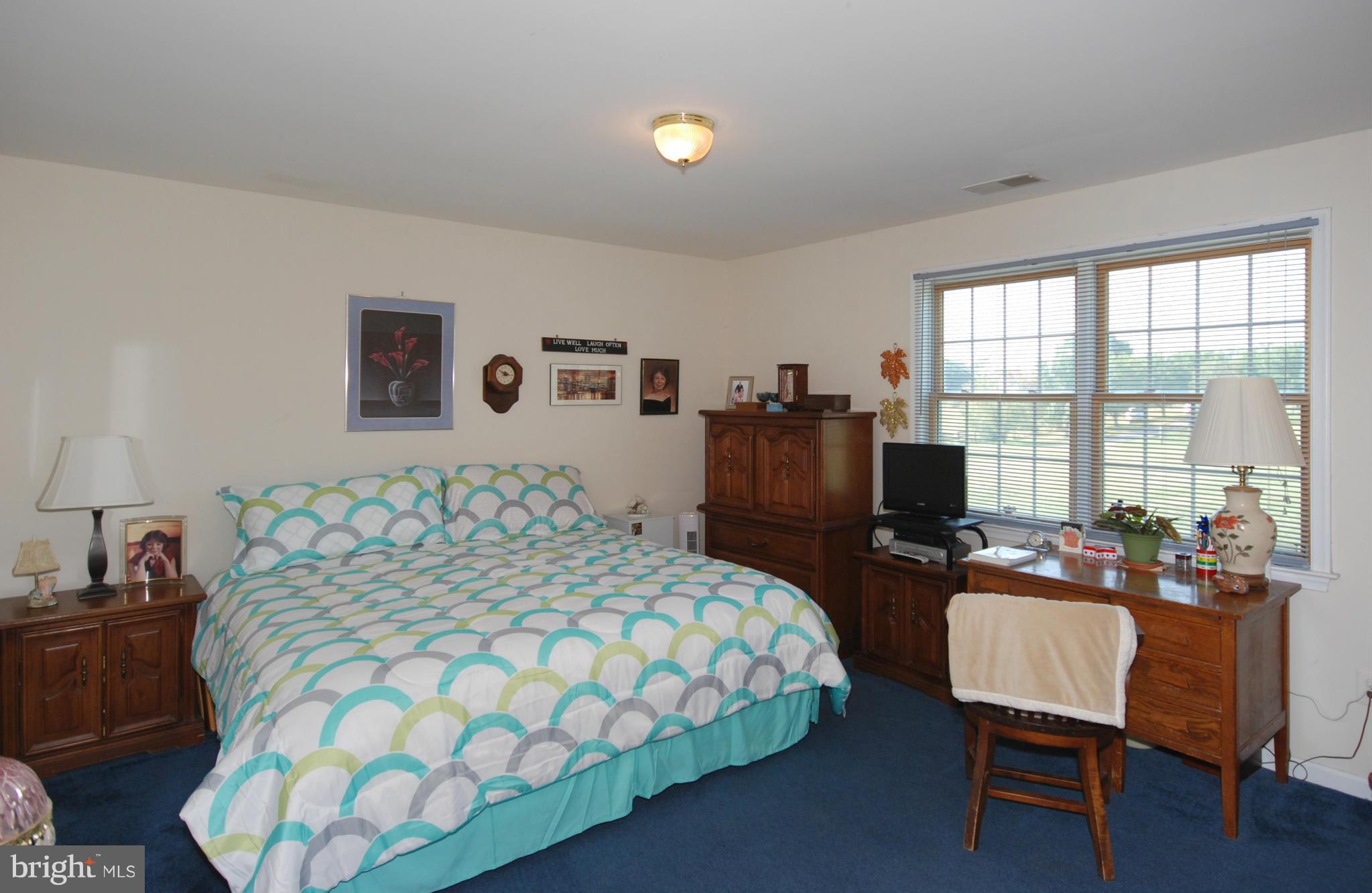 2118 Laurel Grove Road Winchester, VA 22602 - Photo 12 of 29 a bedroom with a bed and furniture
