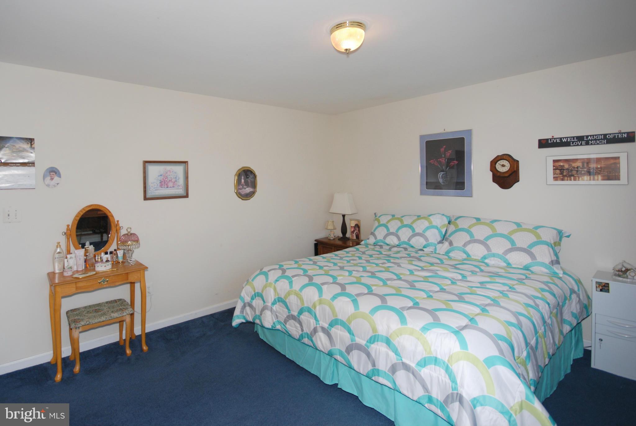 2118 Laurel Grove Road Winchester, VA 22602 - Photo 13 of 29 a bedroom with a bed and a window