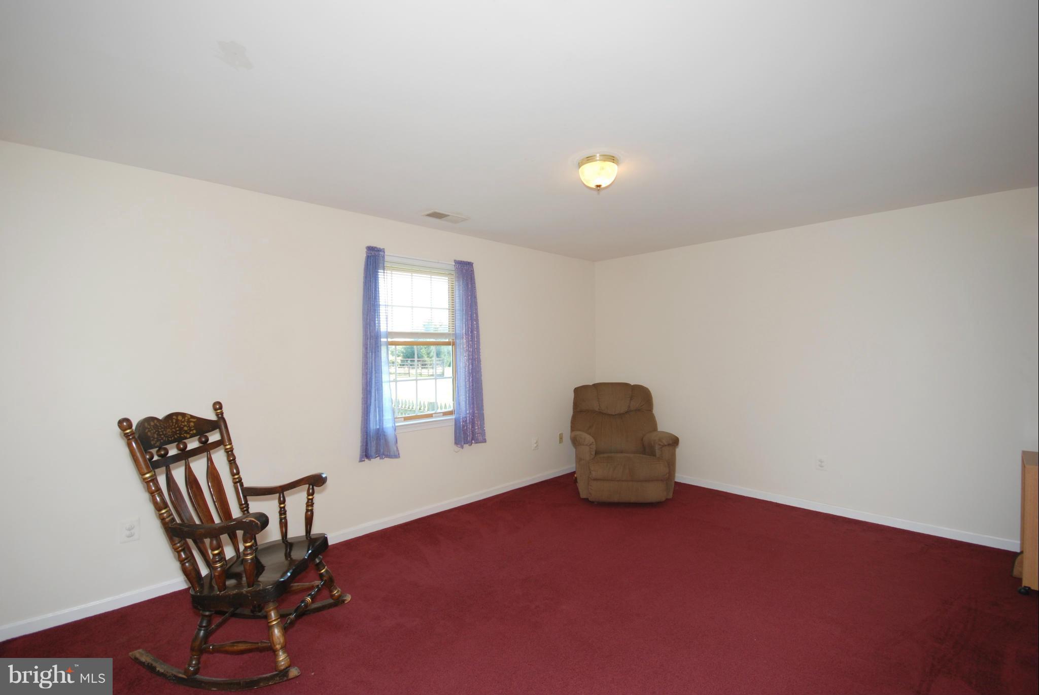 2118 Laurel Grove Road Winchester, VA 22602 - Photo 15 of 29 a view of a livingroom with chairs and window