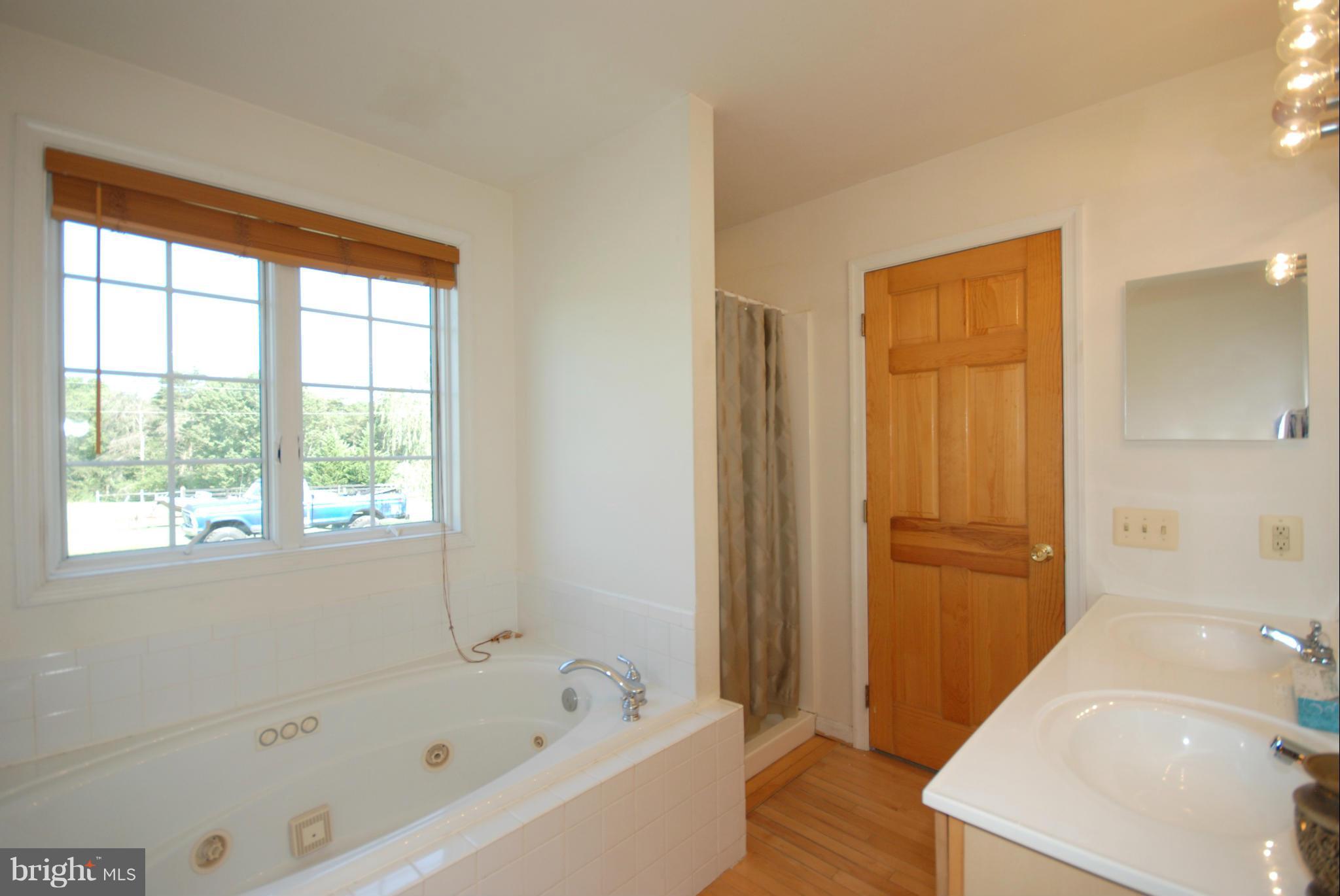 2118 Laurel Grove Road Winchester, VA 22602 - Photo 19 of 29 a bathroom with a tub and sink