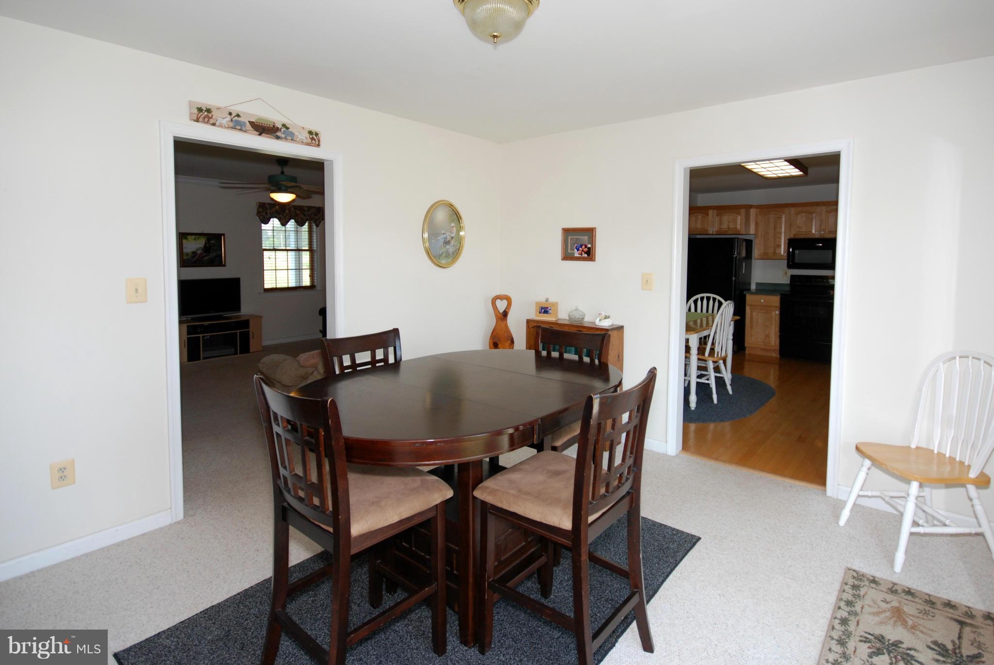 2118 Laurel Grove Road Winchester, VA 22602 - Photo 8 of 29 a dining room with furniture and window