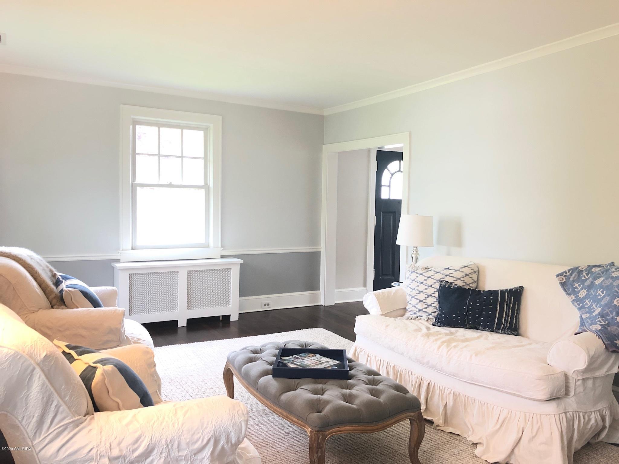 10 Lake Drive South, Unit SOUTH Riverside, CT 06878 - Photo 12 of 45 a living room with furniture and two window