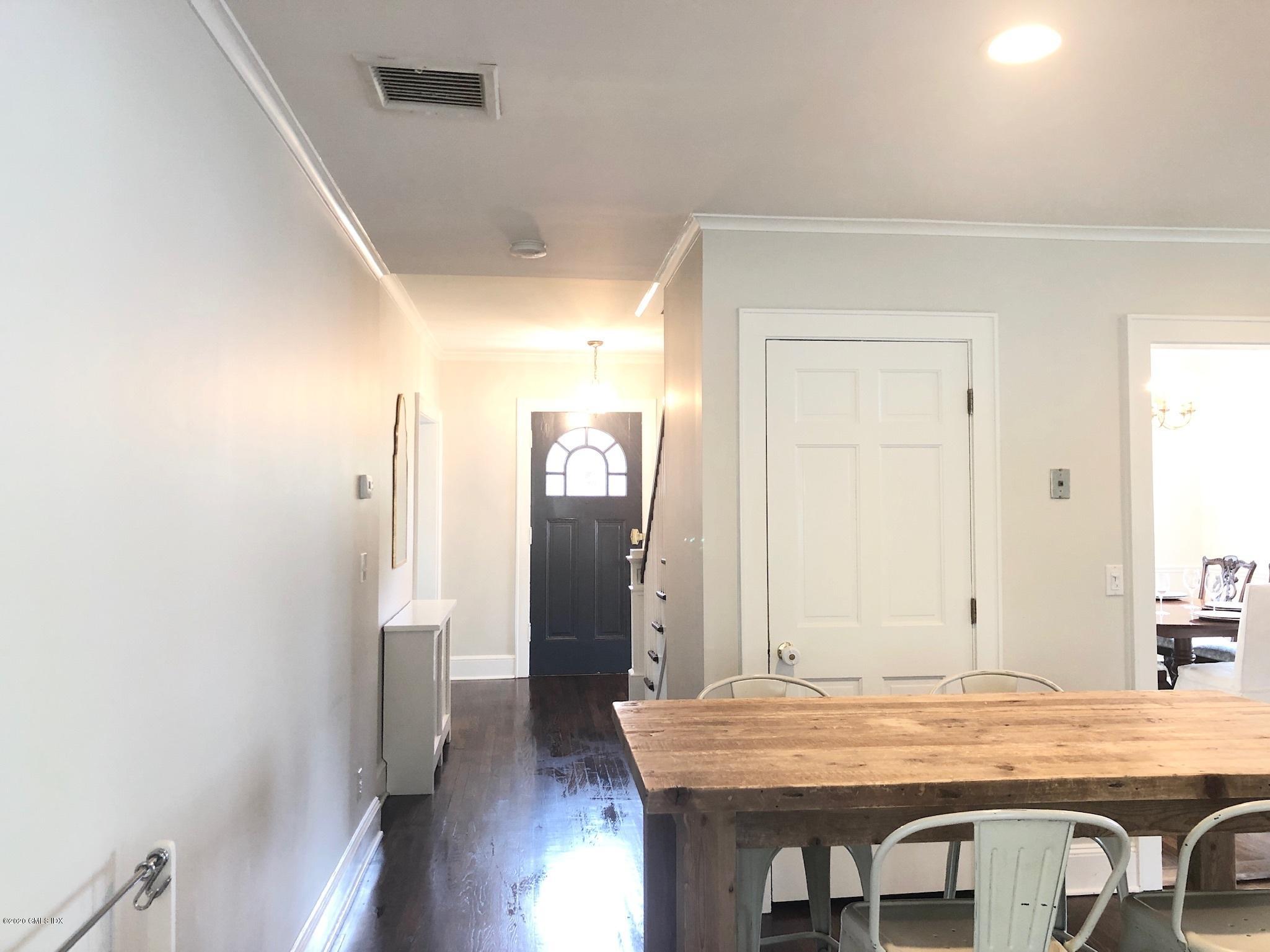 10 Lake Drive South, Unit SOUTH Riverside, CT 06878 - Photo 16 of 45 a view of a hallway with wooden floor