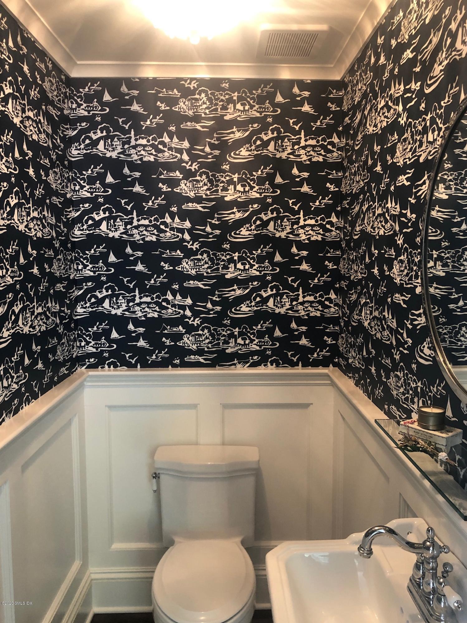 10 Lake Drive South, Unit SOUTH Riverside, CT 06878 - Photo 20 of 45 a bathroom with a toilet and a sink