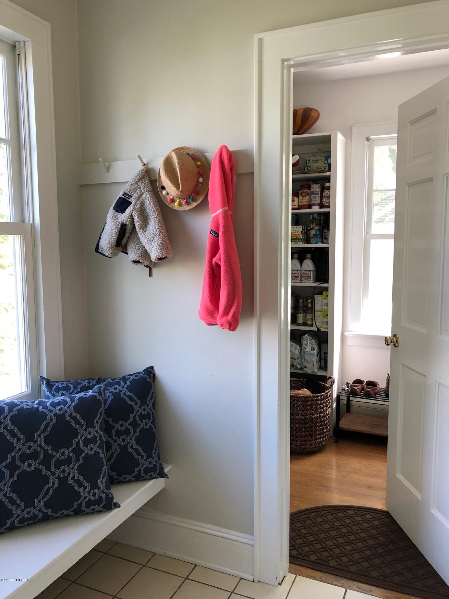 10 Lake Drive South, Unit SOUTH Riverside, CT 06878 - Photo 22 of 45 a bedroom with a bed and a window