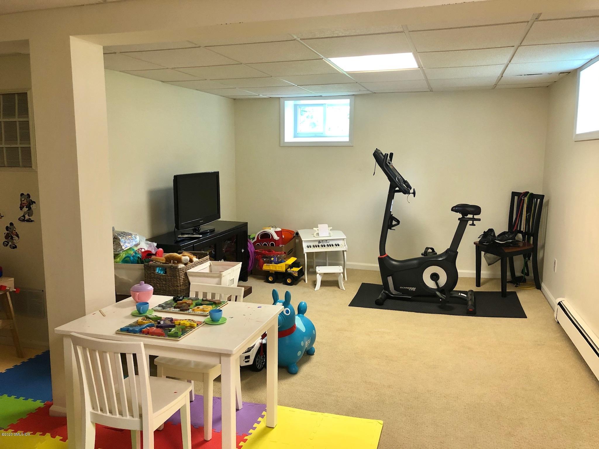 10 Lake Drive South, Unit SOUTH Riverside, CT 06878 - Photo 37 of 45 a view of a room with gym equipment