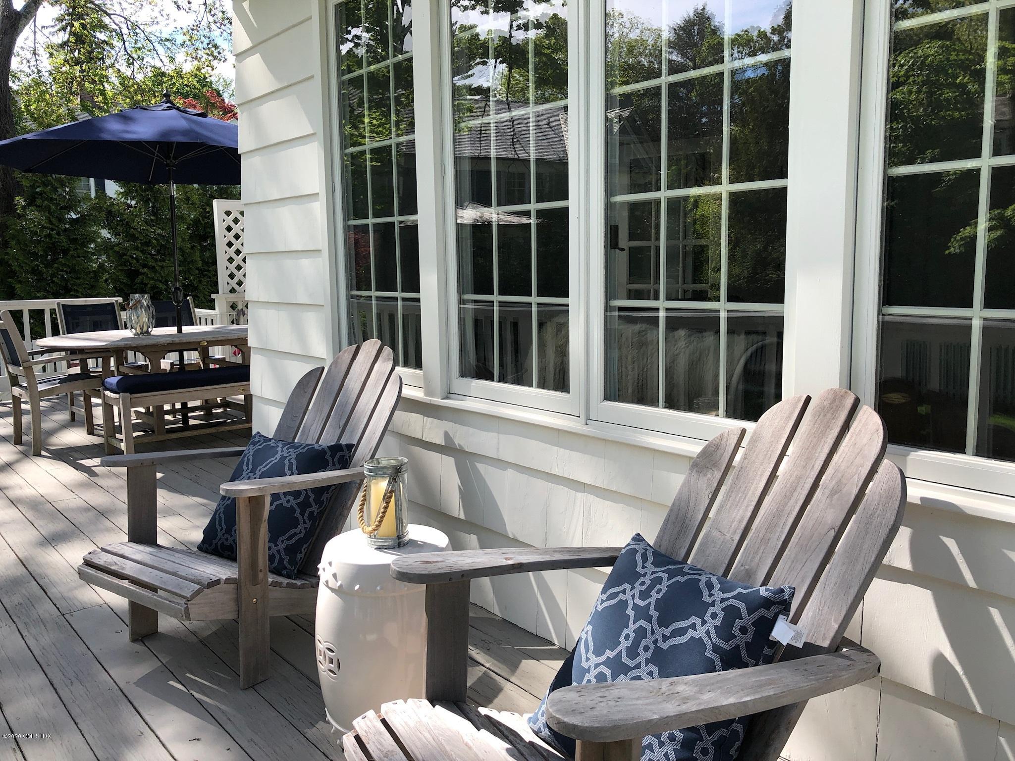 10 Lake Drive South, Unit SOUTH Riverside, CT 06878 - Photo 39 of 45 a view of balcony with two chairs and a large window