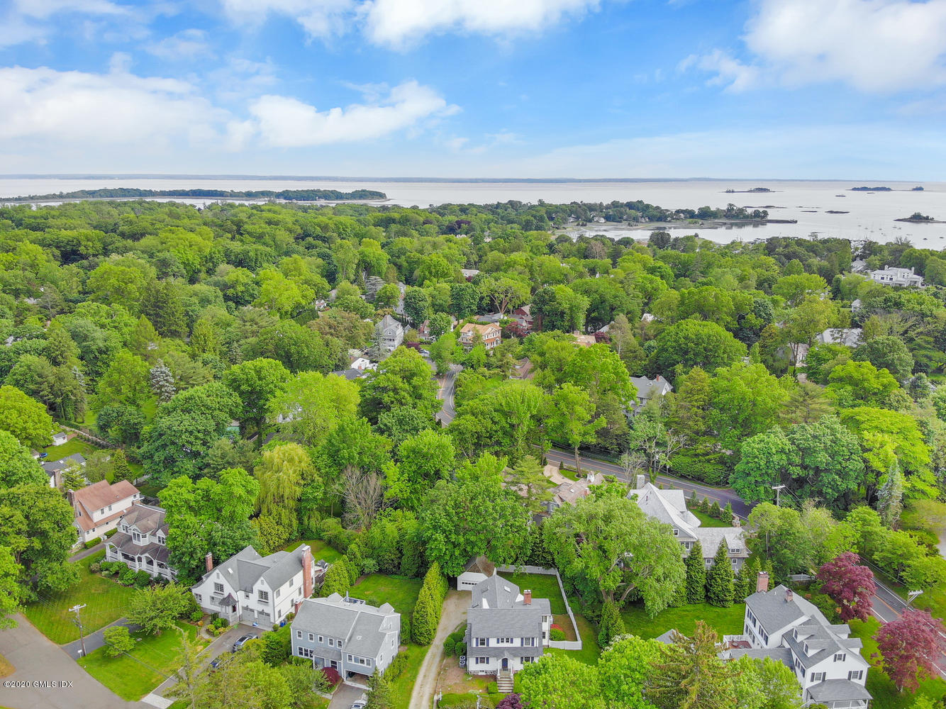 10 Lake Drive South, Unit SOUTH Riverside, CT 06878 - Photo 5 of 45 an aerial view of a city with lots of residential buildings
