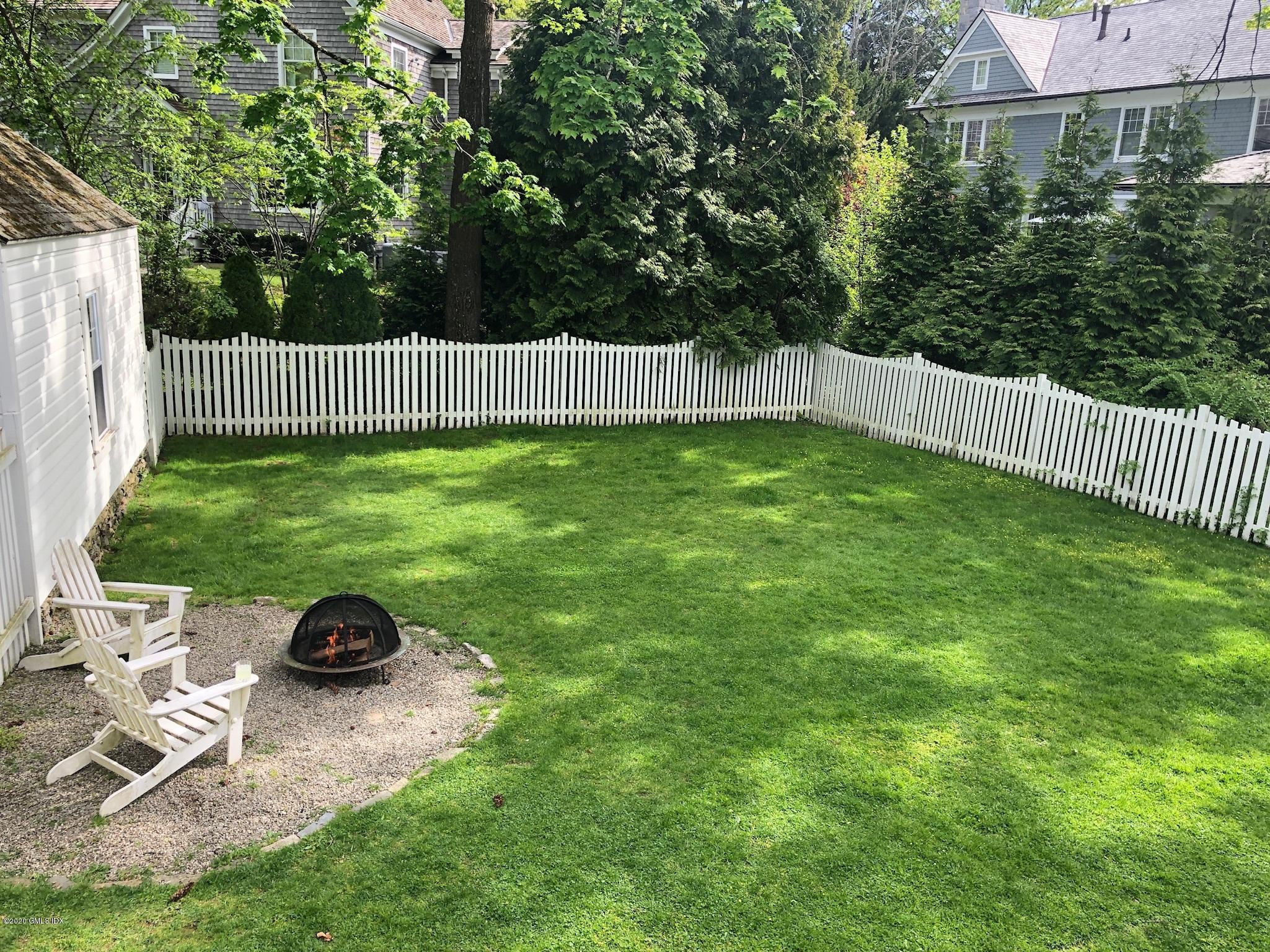 10 Lake Drive South, Unit SOUTH Riverside, CT 06878 - Photo 6 of 45 a view of a garden and deck