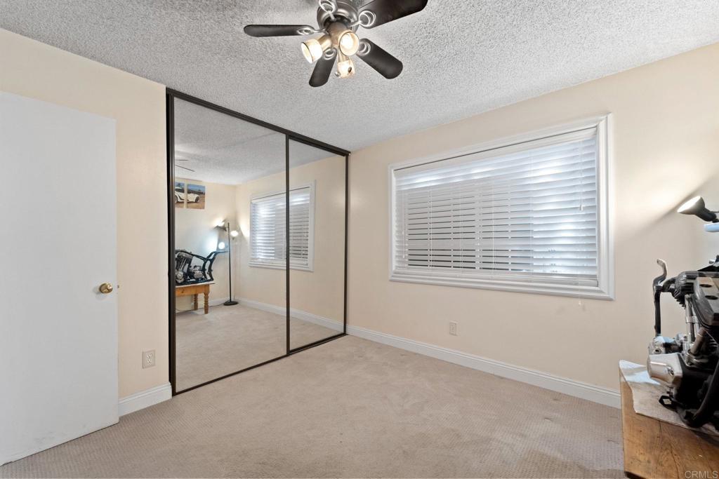 2461 Trace Road Spring Valley, CA 91978 - Photo 16 of 26 a view of an empty room with a window