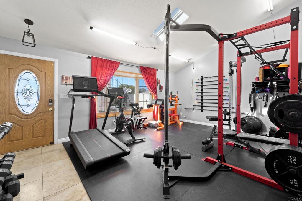 2461 Trace Road Spring Valley, CA 91978 - Photo 18 of 26 a view of a room with gym equipment